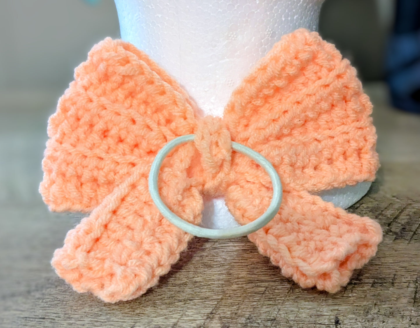 Handmade Crochet Bow Hair Tie – Soft Peach Bow Scrunchie – Cute Elastic Hair Accessory for Girls & Women